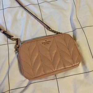 Small pink Kate Spade quilted crossbody purse